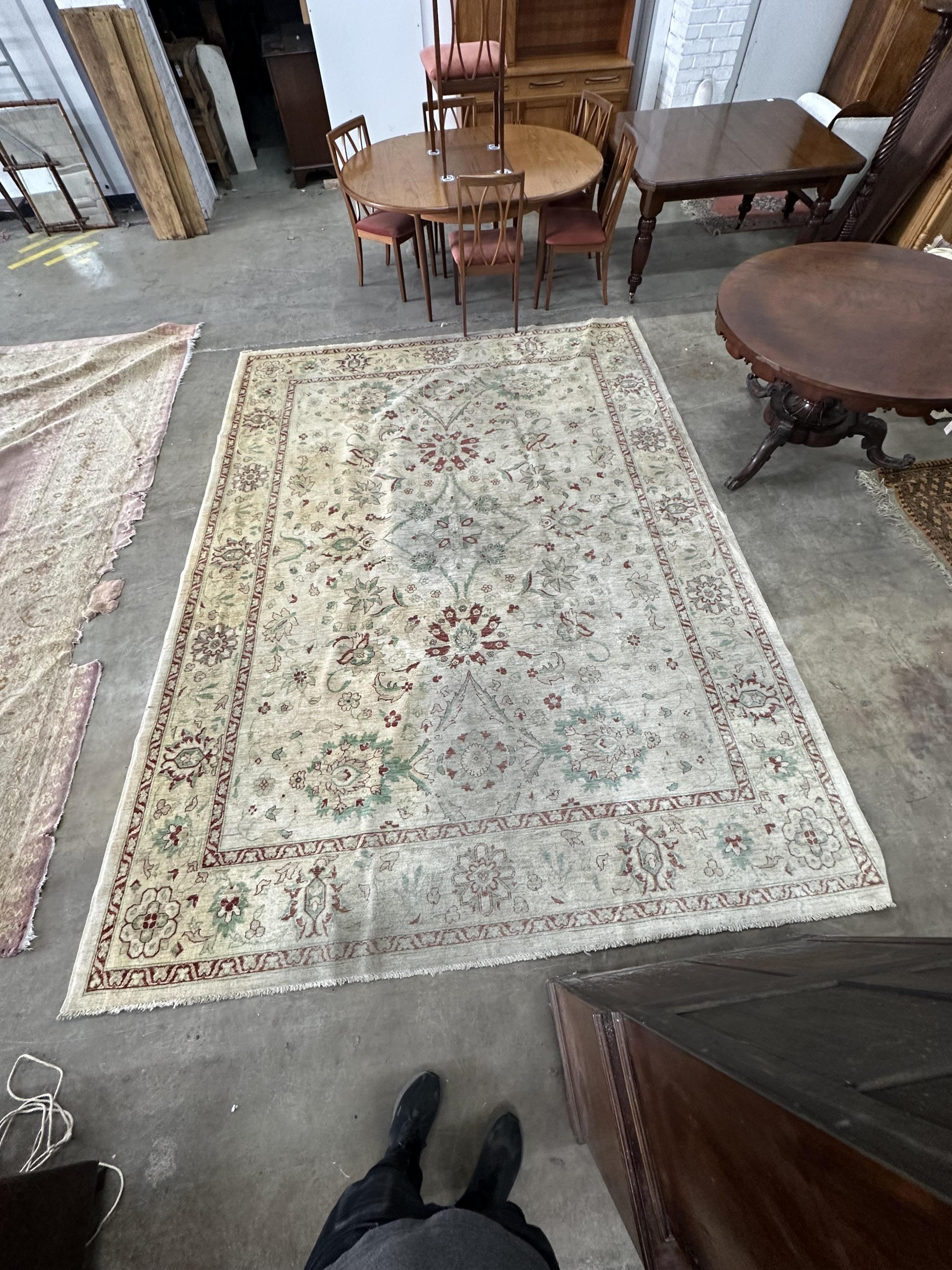 An Indian carpet, approximately 380 x 280cm. Condition - good